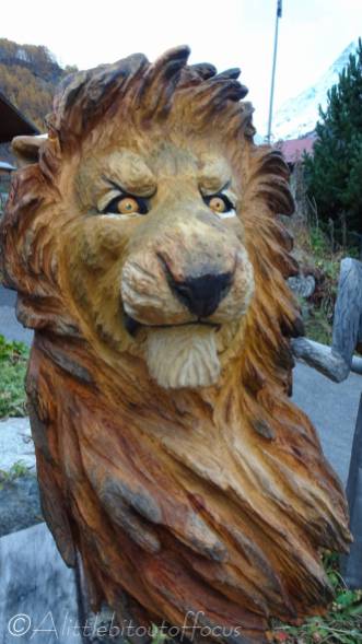 26 Lion wood carving